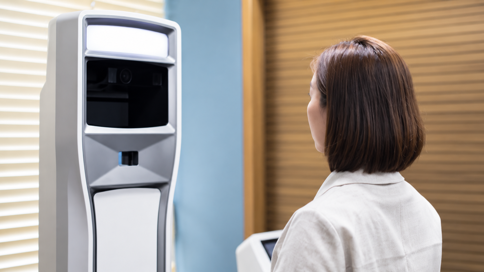 Patient undergoing breast assessment before revision breast surgery consultation at TAE Plastic Surgery Clinic in Busan, Korea