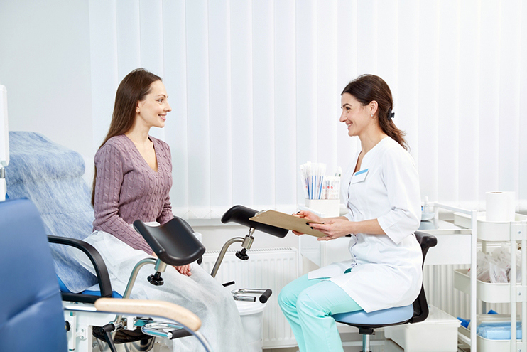 Woman consulting a physician about women’s health checkups and preventive care
