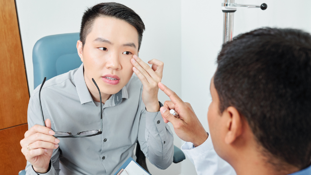 Clinical examination of lower eyelid tone and under-eye structure prior to surgery