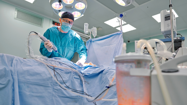 Plasma-energy body skin tightening procedure performed by a surgeon in a sterile operating room