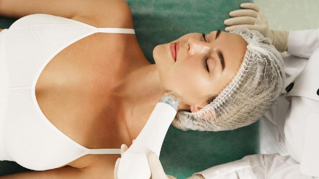 Laser pore treatment on acne-prone skin.