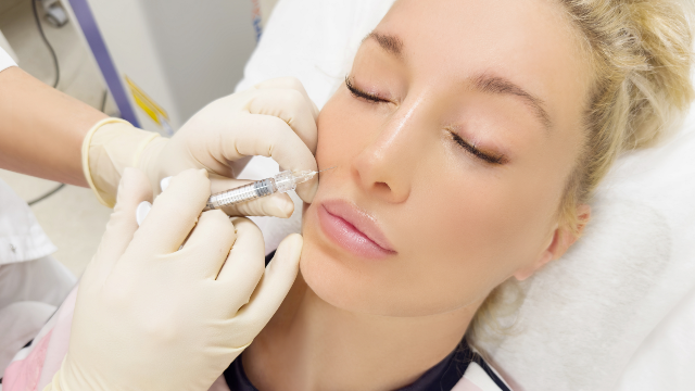 Patient receiving a skin booster treatment on the face.