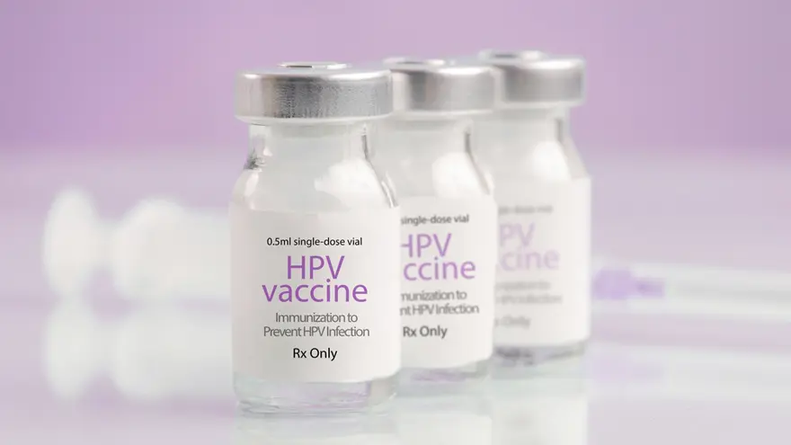 Vials labeled “HPV vaccine” arranged on a clean surface, representing preventive immunization used to protect against human papillomavirus infection and reduce the risk of HPV-related diseases.